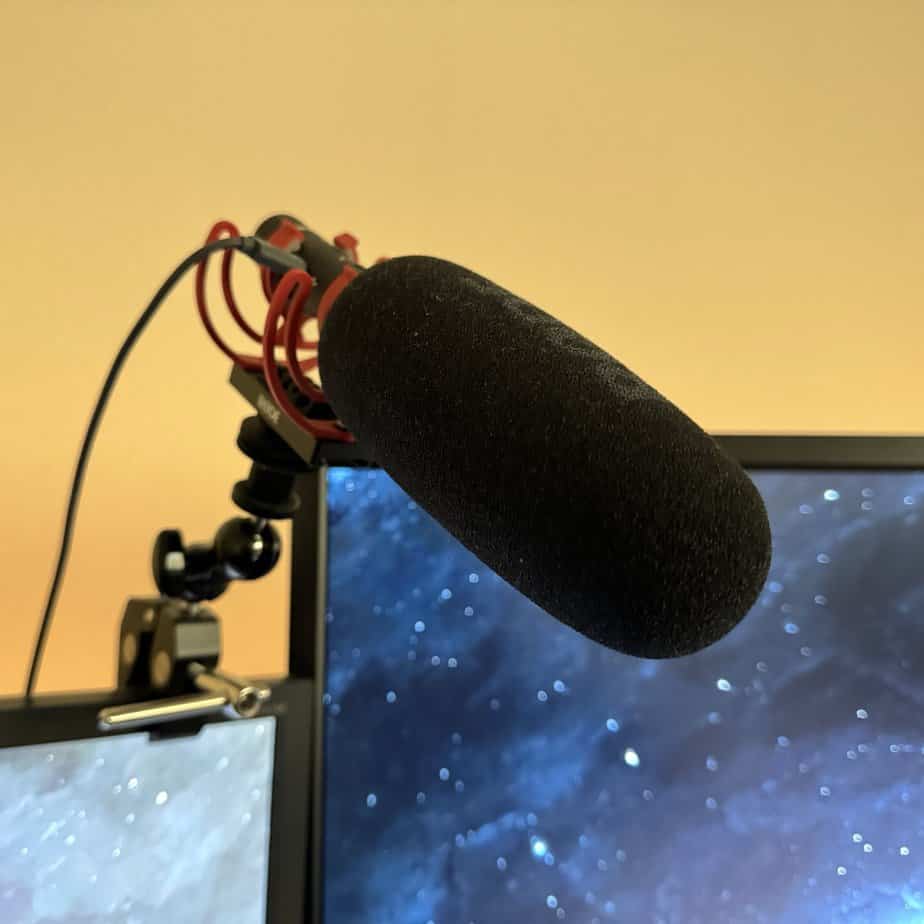 Microphone clamped to a computer monitor